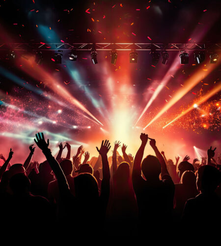 Concert crowd with colorful stage lights and confetti Concert crowd with colorful stage lights and confetti